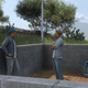 People in Forza hiding and waiting behind concrete walls.